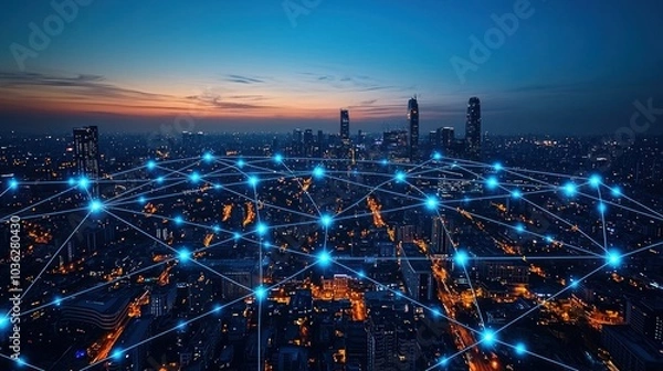 Fototapeta Nighttime aerial view of a city with a network of glowing blue lines connecting buildings