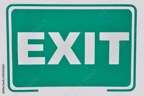 Fototapeta Close up of a exit sign for stairway. Green emergency exit sign.