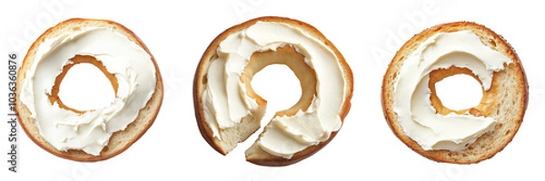 Obraz A halved toasted bagel spread with creamy white cream cheese, isolated on a transparent background