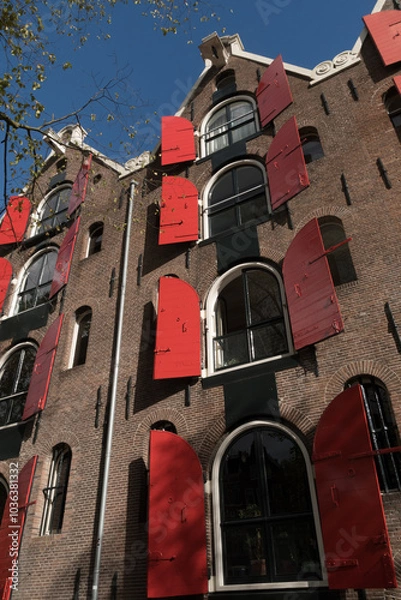 Obraz Opened windows of canal houses with red shutters in Jordaan - 3