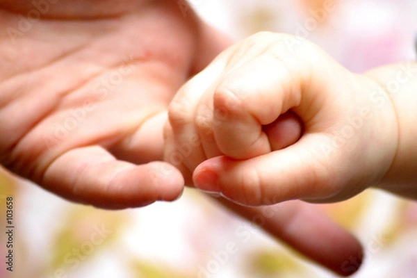 Obraz uścisk dłoni dziecka