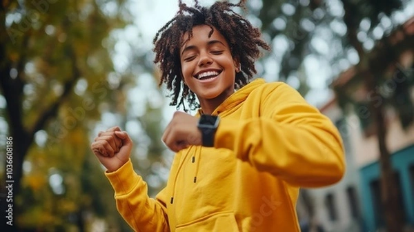 Obraz Energetic gen z dancer syncing with music on wireless smartwatch, Generative AI