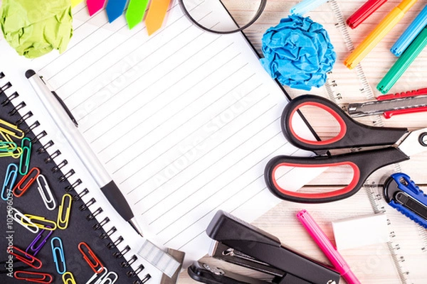 Obraz Office supplies with striped notepad