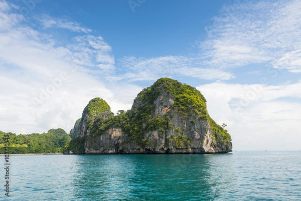 Fototapeta Thailand tropical island cliffs over ocean water during tourist boat trip in Railay Beach resort