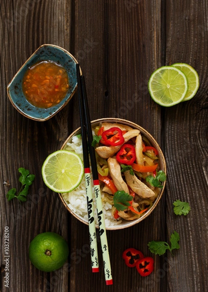 Obraz Stir fry with turkey and vegetables with rice.
