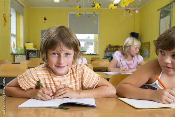 Fototapeta Children in a yellow classroom. 