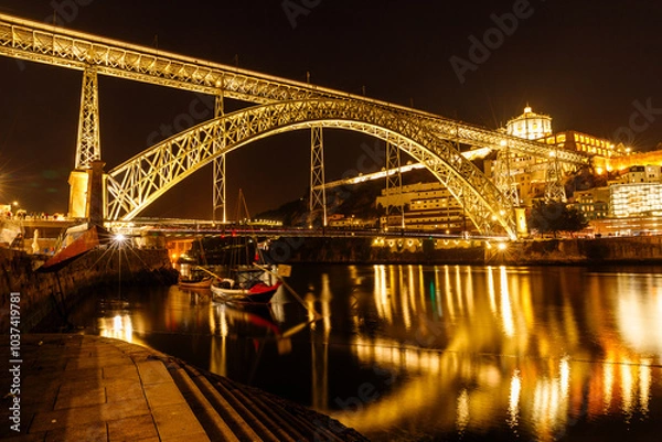 Obraz View of the beautiful steel bridge over the Duero River in Porto in the evening