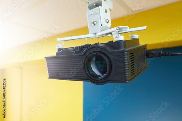 Obraz A media projector fixed to the ceiling