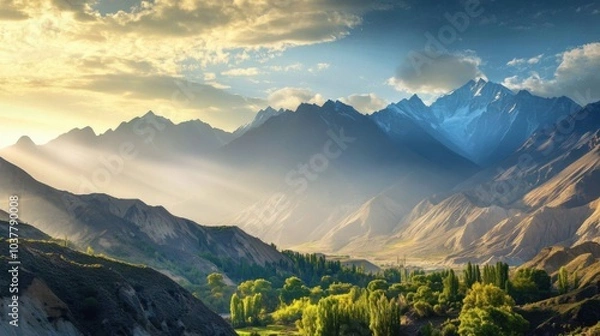 Fototapeta Majestic mountain landscape with sunlight and lush greenery.