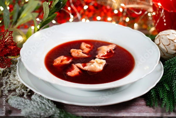 Obraz Traditional Polish Christmas beetroot soup with dumplings
