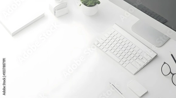 Fototapeta 85. White desk setup with a computer and minimal stationery in a bright workspace