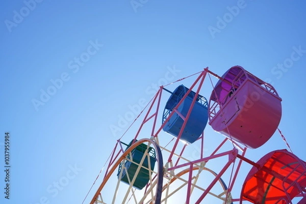 Obraz レトロな遊園地の観覧車と青空