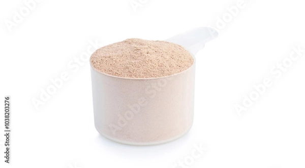 Fototapeta A scoop of chocolate whey protein powder on a white background.