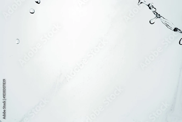 Fototapeta Water splash isolated on blue background. Transparent realistic water with movement and drops. Dynamic flight of water drops.