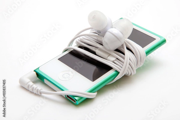 Obraz Portable musical player with headphones iisolated on the white
