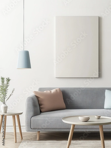 Fototapeta modern living room featuring light gray sofa with decorative pillows, minimalist pendant light, and round coffee table. neutral color palette creates calm and inviting atmosphere