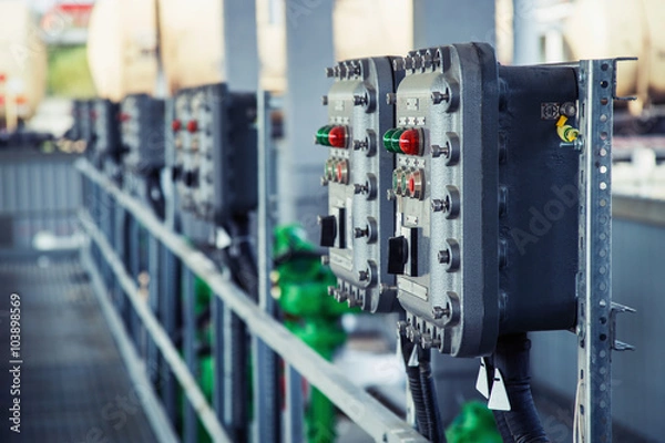 Obraz Part of power plant control panel with switches and lamps