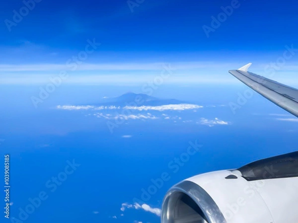 Fototapeta sky view from airplane window, blue sky