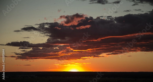 Obraz закатное солнце с облаками