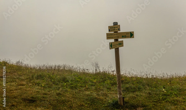 Fototapeta 08-25-2021 - France normal way to Mont Blanc, Mont Lachat elevation pointer and signpost on way to top