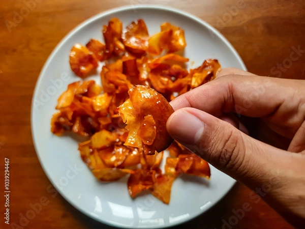 Fototapeta processed from cassava raw materials made into chips with a sweet and savory spicy sauce