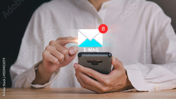 Fototapeta man reading electronic mail ,Email marketing and newsletter concept,Digital communication with email messages,Sending and receiving messages online with the email icon ,notifications