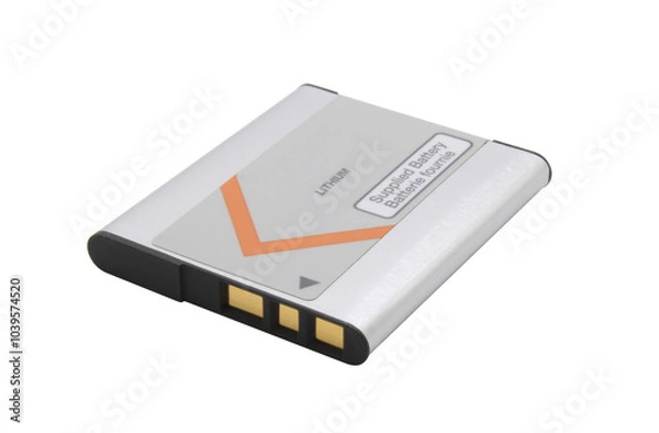 Fototapeta Old lithium battery from a camera with gold contacts on an isolated background.