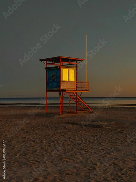 Obraz lifeguard tower at sunset