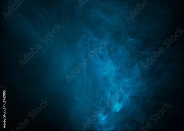 Obraz Blue smoke over black studio background