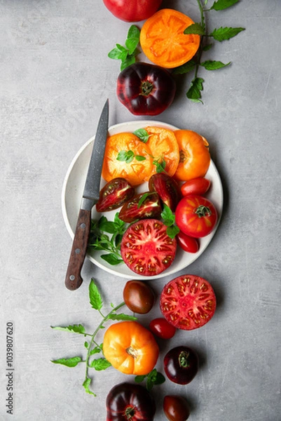 Fototapeta High-resolution image of fresh, juicy red tomatoes with water droplets on a clean background. This photo is perfect for promoting organic produce, healthy food, or farm-to-table concepts. 