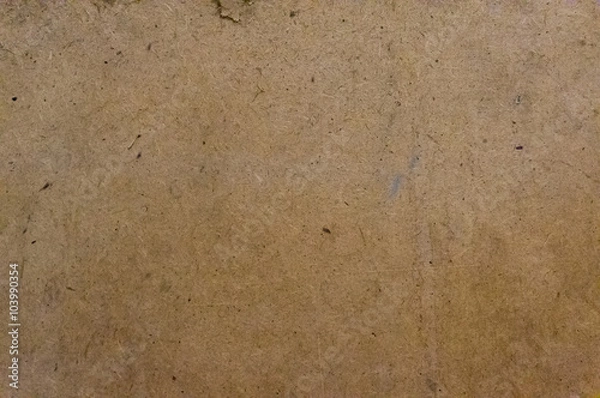 Fototapeta Close up grunge cardboard photo texture. Background for your design in loft style.