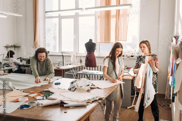 Obraz Collaboration designer and tailors in the shop