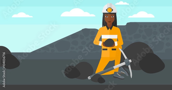 Obraz Miner holding coal in hands.