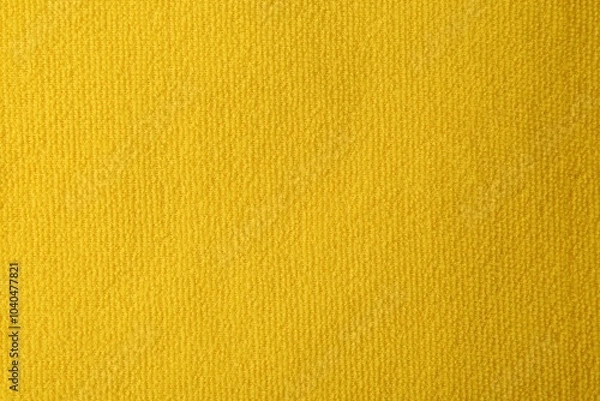 Obraz Clean yellow microfiber cloth as background, top view