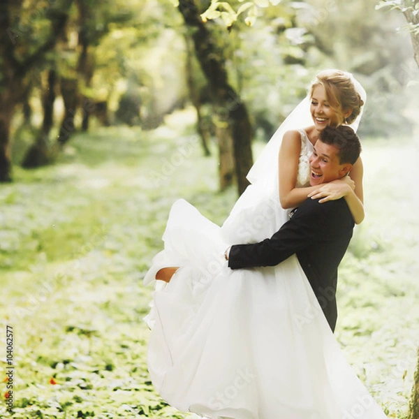 Obraz luxury stylish young bride and groom on the background  spring s