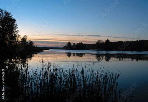 Fototapeta Sunset on the lake in Zegrze. Central Poland, late summer.