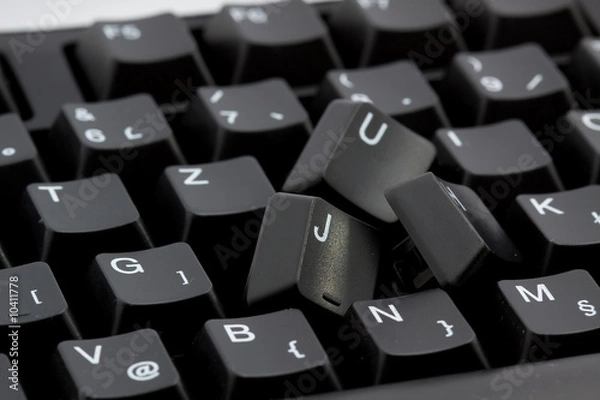 Obraz broken black computer keyboard isolated