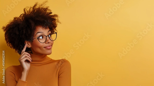 Fototapeta Young, creative, and pretty black woman with glasses thinking about her marketing startup business on isolated dark background with copy space