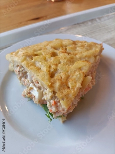 Fototapeta Potato omelette stuffed with ensaladilla.