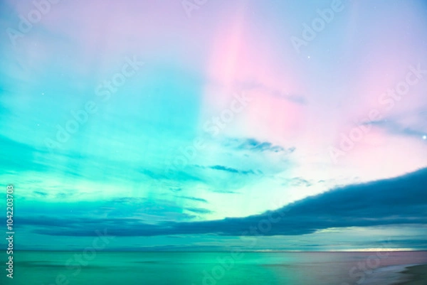 Fototapeta aurora borealis, northern lights above baltic sea in poland, stegna, october 2024