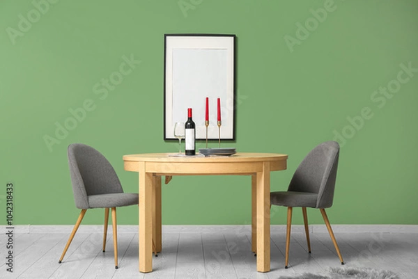 Fototapeta Table with candles and wine in dining room