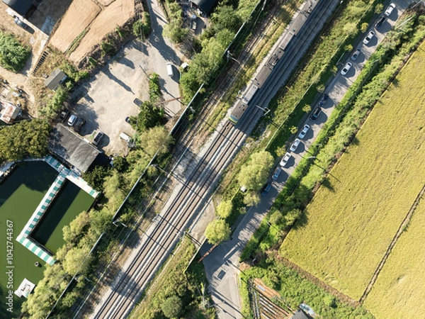 Fototapeta Aerial view of train, a railway in countryside