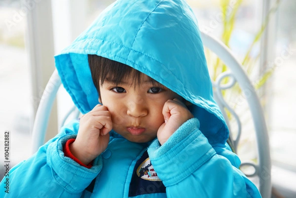 Obraz 不機嫌な男の子