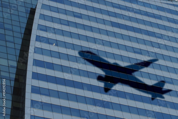Fototapeta Plane shadow on building background