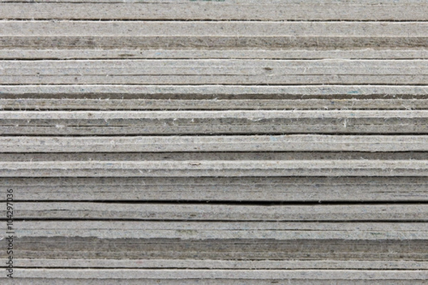 Fototapeta close-up of stack cardboard on white background