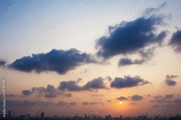 Obraz Sunset sky with clouds and sun