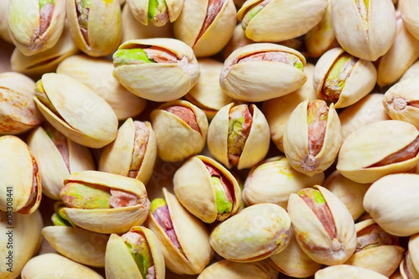 Obraz cracked fresh pistachios background