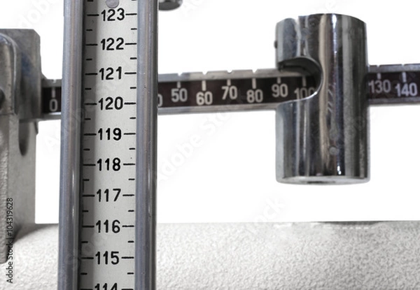 Fototapeta scales in the doctor's clinic to measure the weight and height o