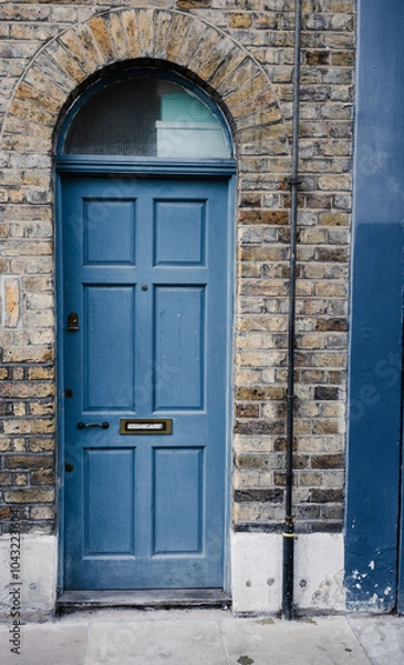 Obraz Old blue door with Brown brick