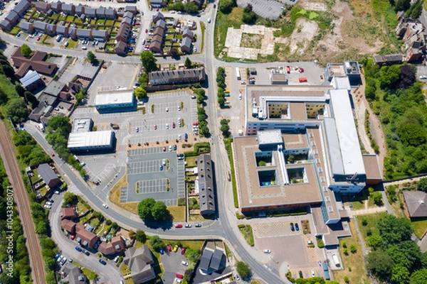 Fototapeta Straight down top aerial photo of the Pontefract Hospital located in the village of Pontefract in Wakefield in the UK on a sunny summers day showing the Hospital and grounds